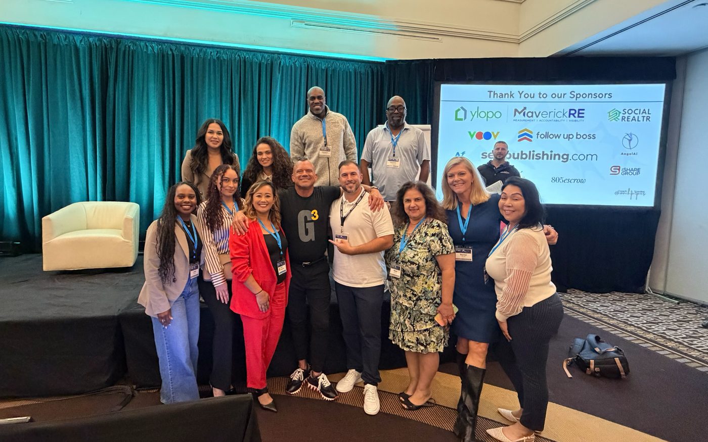 Jennifer Insisoulath with fellow real estate professionals at an industry event