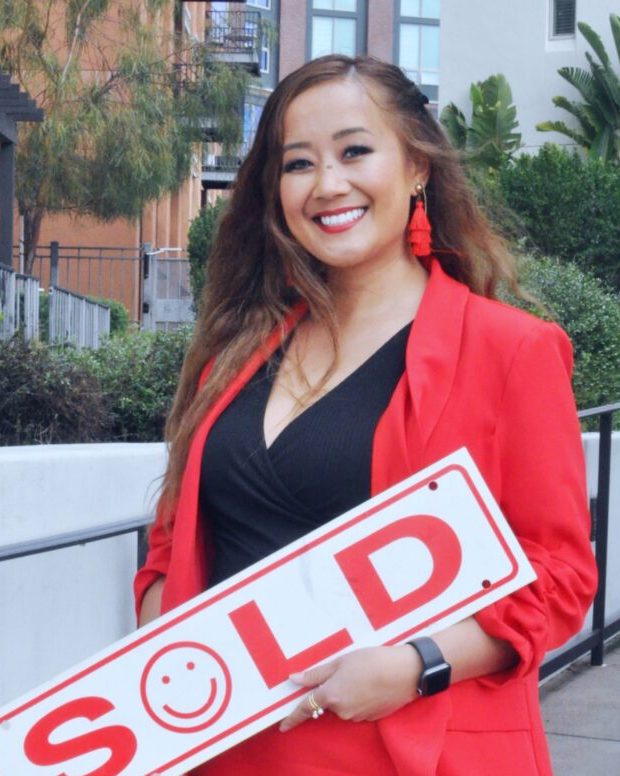 Portrait of Jennifer Insisoulath, founder of The Millennial Agent®